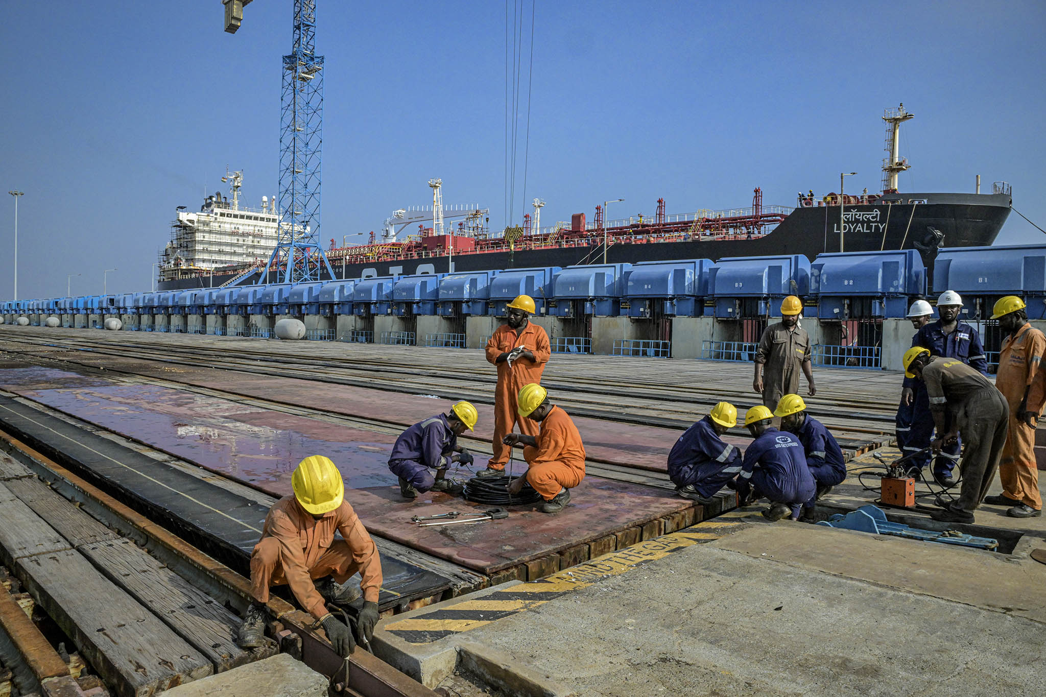 Workers at a state-of-the-art shipyard where U.S. Navy ships have docked for repairs in Kattupalli, an industrial hamlet north of Chennai, India, September 22, 2023. (Atul Loke/The New York Times)