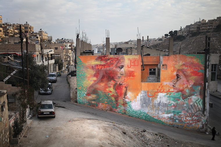 In Amman, Jordan, artist Jonathan Darby discussed with young men and women traditions that hold women back. They painted a mural in which a woman and a girl share their gaze. The image seeks to invoke the passing to new generations of courage to make change. Photo: aptART