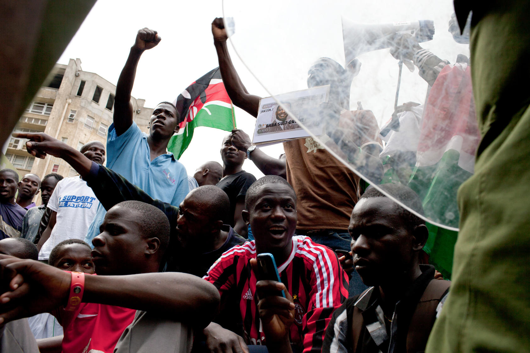 Supporters of Raila Odinga, Kenya's prime minister and presidential candidate, stage a protest outside the Supreme Court in Nairobi, March 30, 2013. The court on Saturday unanimously upheld the election victory of Uhuru Kenyatta as the country's president, dismissing allegations that the election had been rigged. 