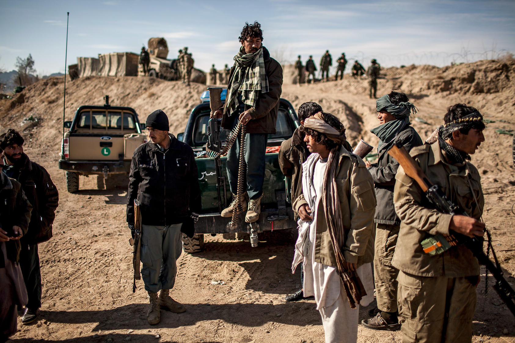 Members of the Afghan Local Police prepare for a mission in Kakeran, Afghanistan, Feb. 18, 2013. An American military plan for local auxiliaries to aid the Afghan Army has raised fears of abuses like those that plagued the Afghan Local Police. (Bryan Denton/The New York Times) 