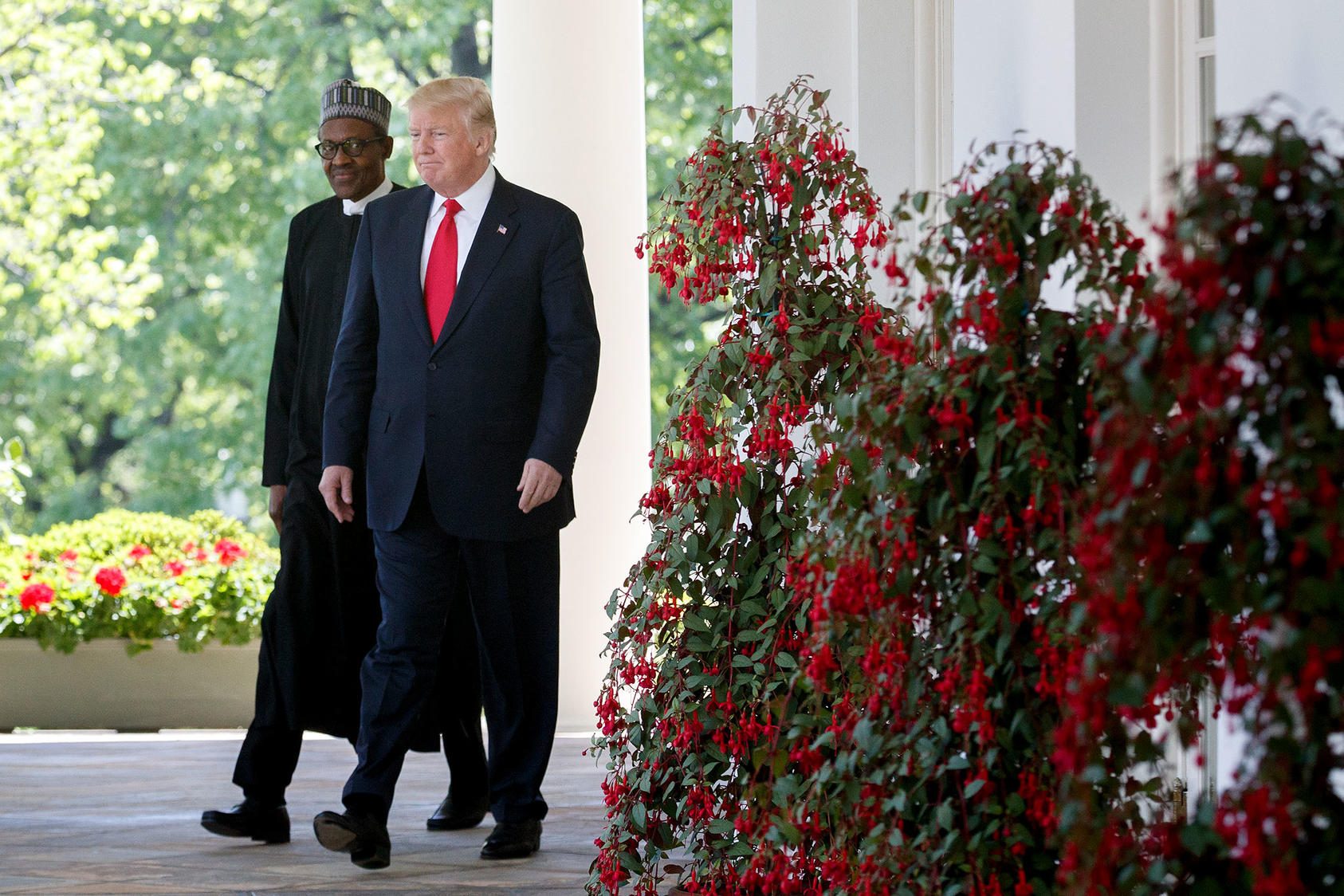 President Donald Trump and Nigerian President Muhammadu Buhari in the Rose Garden at the White House, where they held a joint news conference, in Washington, April 30, 2018. (Tom Brenner/The New York Times)