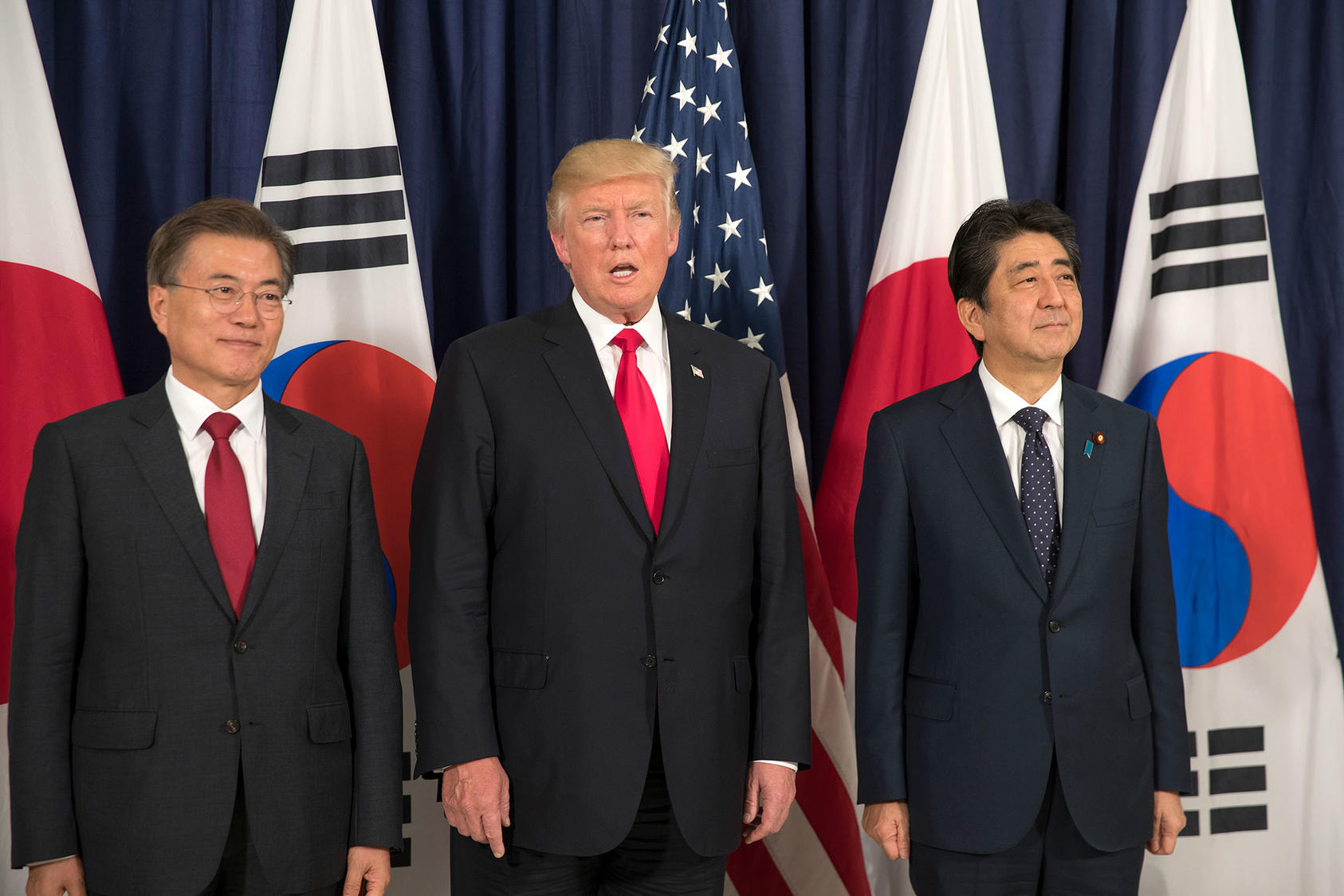 South Korean President Moon Jae-in, President Donald Trump and Japanese Prime Minister Shinzo Abe before the start of the Northeast Asia Security dinner. (Stephen Crowley/The New York Times)