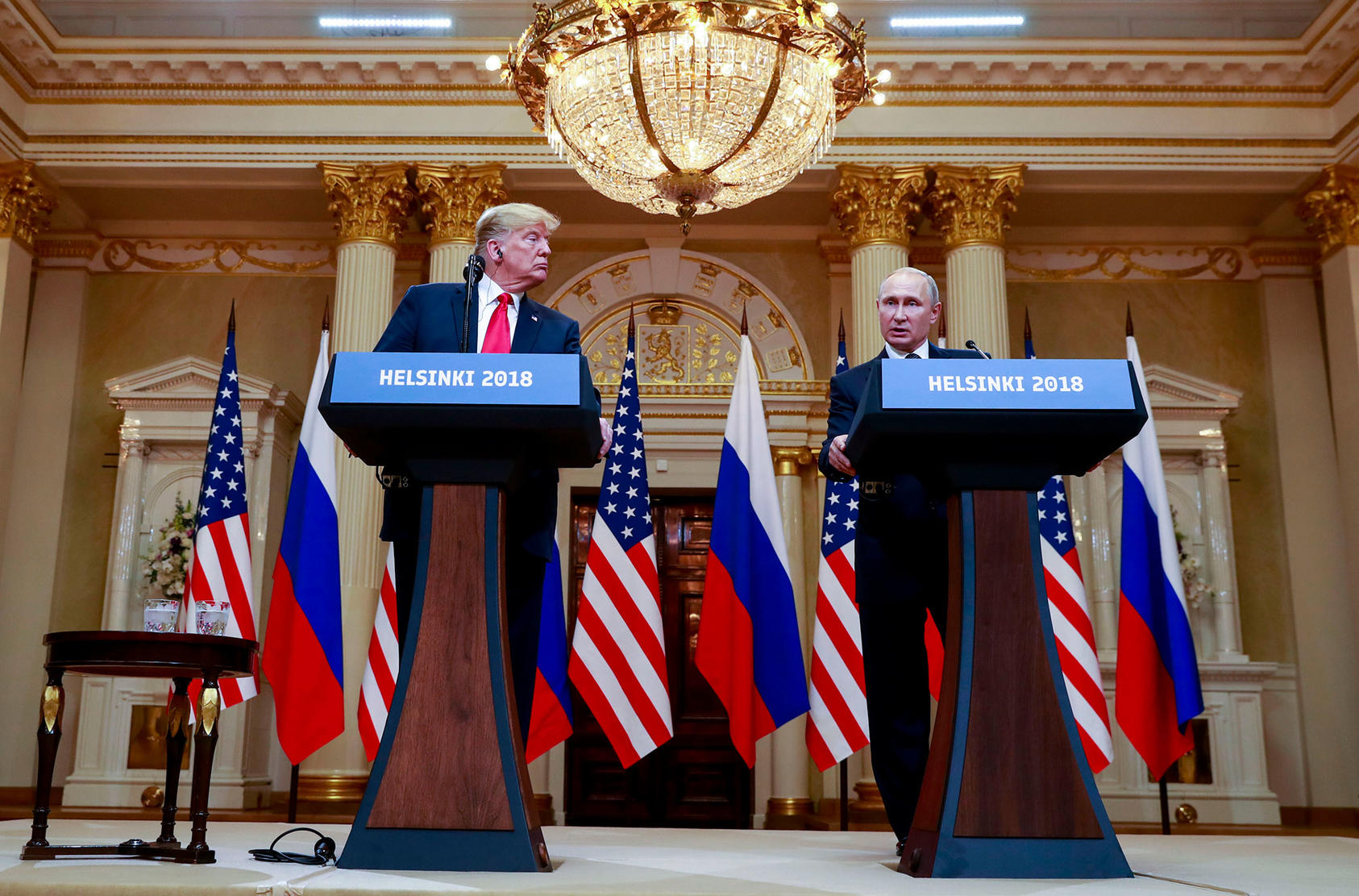 President Donald Trump and President Vladimir Putin of Russia appear at a joint news conference in Helsinki, Finland