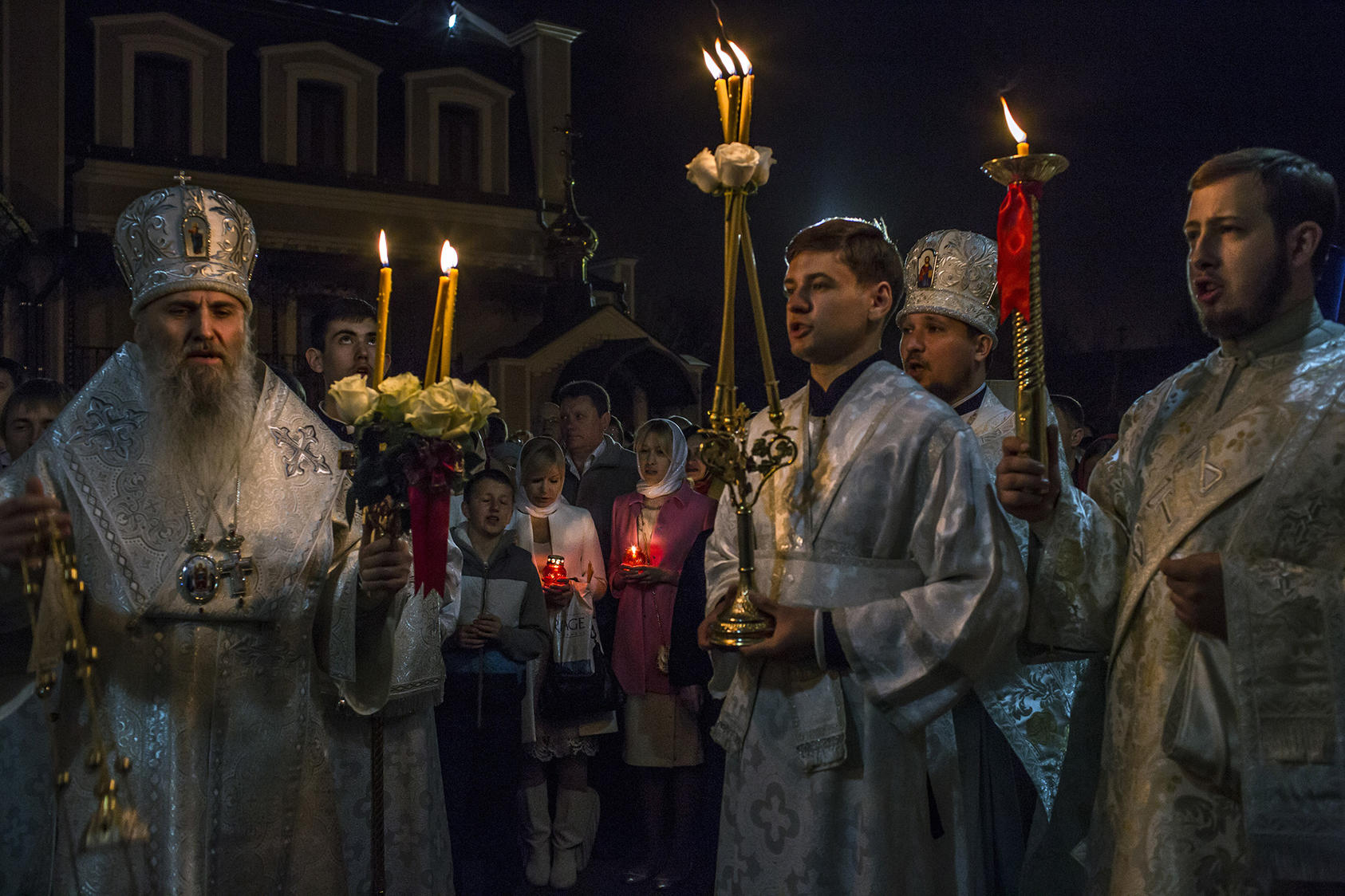 Orthodox worshippers during a midnight Easter ceremony outside the St. Nicholas Cathedral in Donetsk, Ukraine, April 20, 2014. (Mauricio Lima/The New York Times)