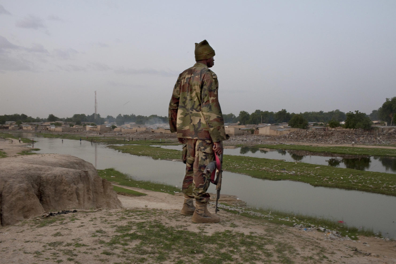 A soldier stands guard in northeastern Nigeria early in the Boko Haram insurgency. Nigeria’s responses to violent conflict have focused on military and police operations, with less focus on prevention efforts. (Samuel James/The New York Times)
