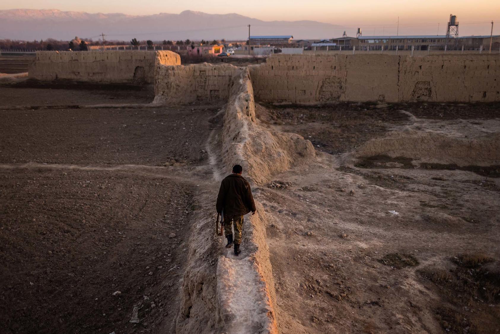An Afghan policeman in Mazar-i-Sharif, a northern city in Afghanistan, on Jan. 17, 2021. The Taliban’s rapid seizure of rural parts of northern Afghanistan has countries in the region preparing for the militiant group to control Afghanistan. (Jim Huylebroek/The New York Times)