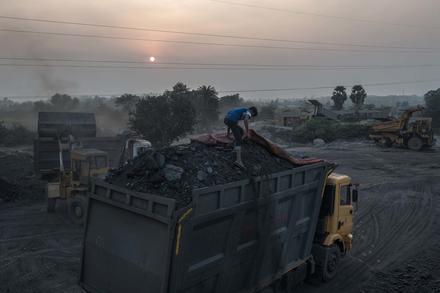 A coal mine in India. Slashing fossil fuel use will include the risks of new conflicts. (Rebecca Conway/The New York Times)