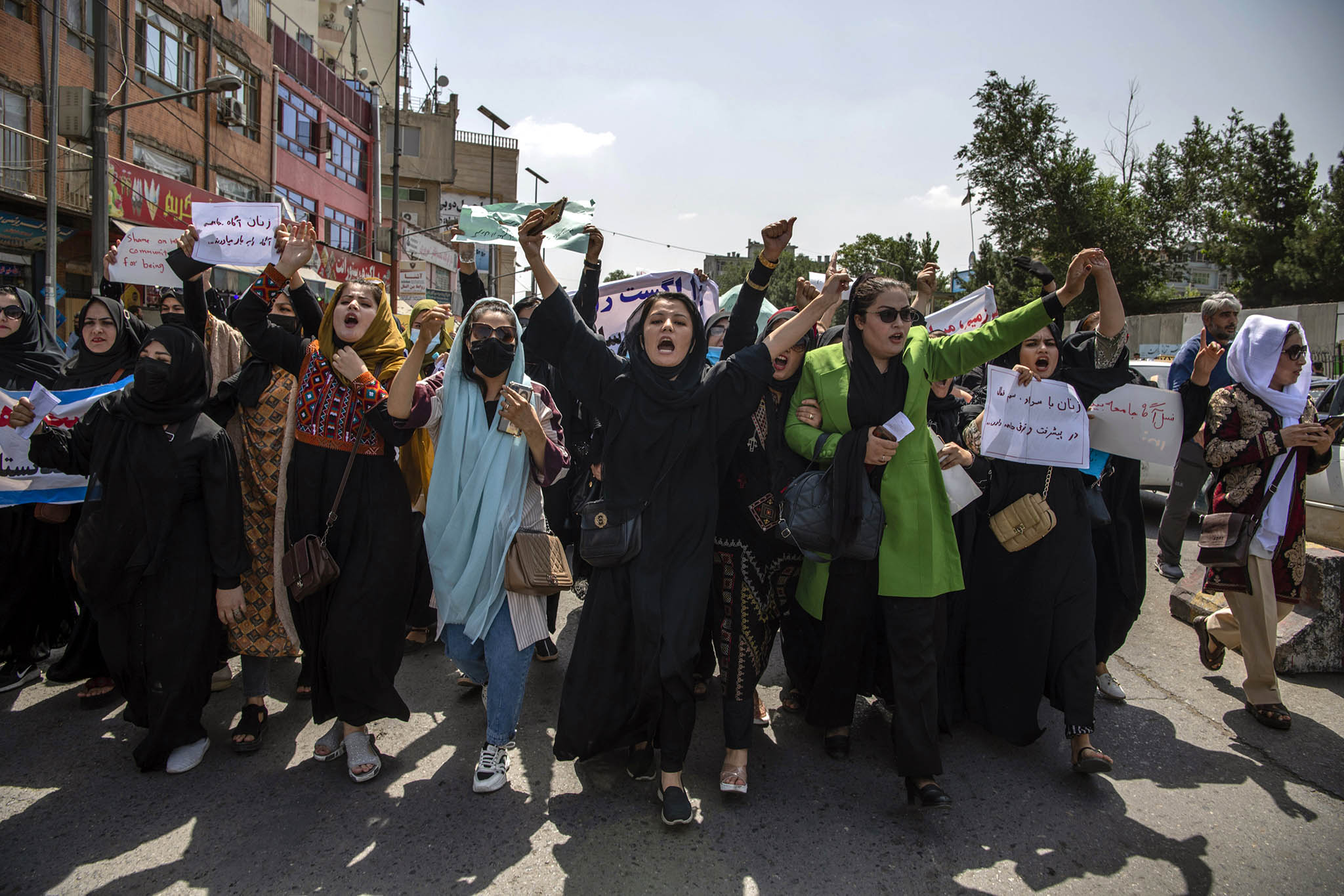 Women protest in Kabul Aug. 13, 2022, after the Taliban administration extended a ban on women working in aid organizations to the United Nations. (Kiana Hayeri/The New York Times)