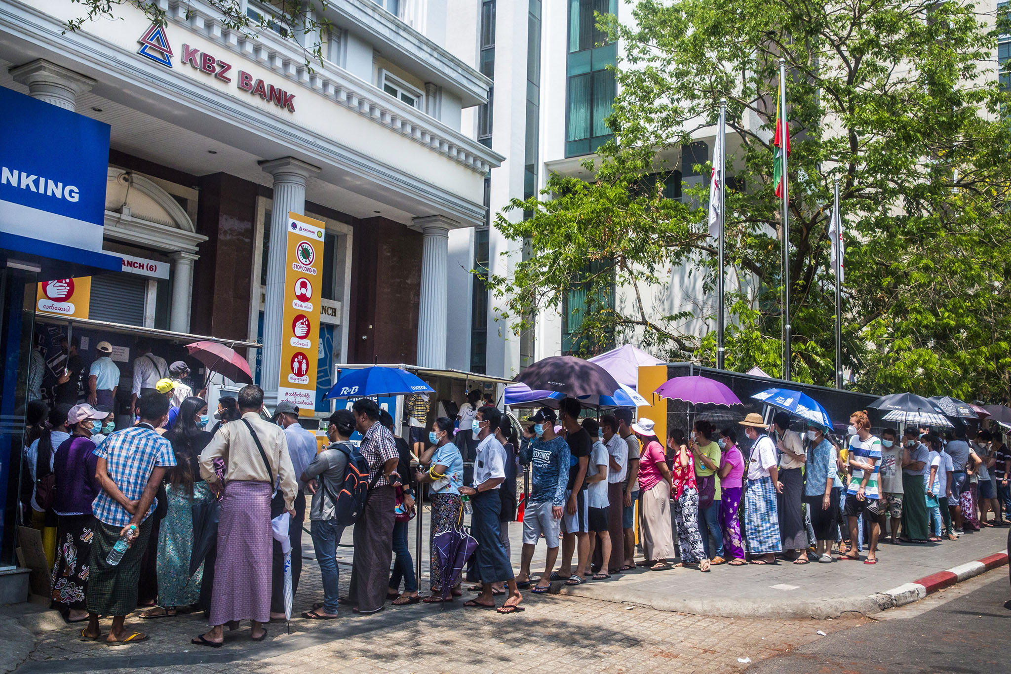 A line to withdraw cash from a bank in Yangon, Myanmar, March 22, 2021. Myanmar has been crippled by a cash shortage since the military seized power six months ago, plunging the Southeast Asian nation into a financial crisis. (The New York Times)