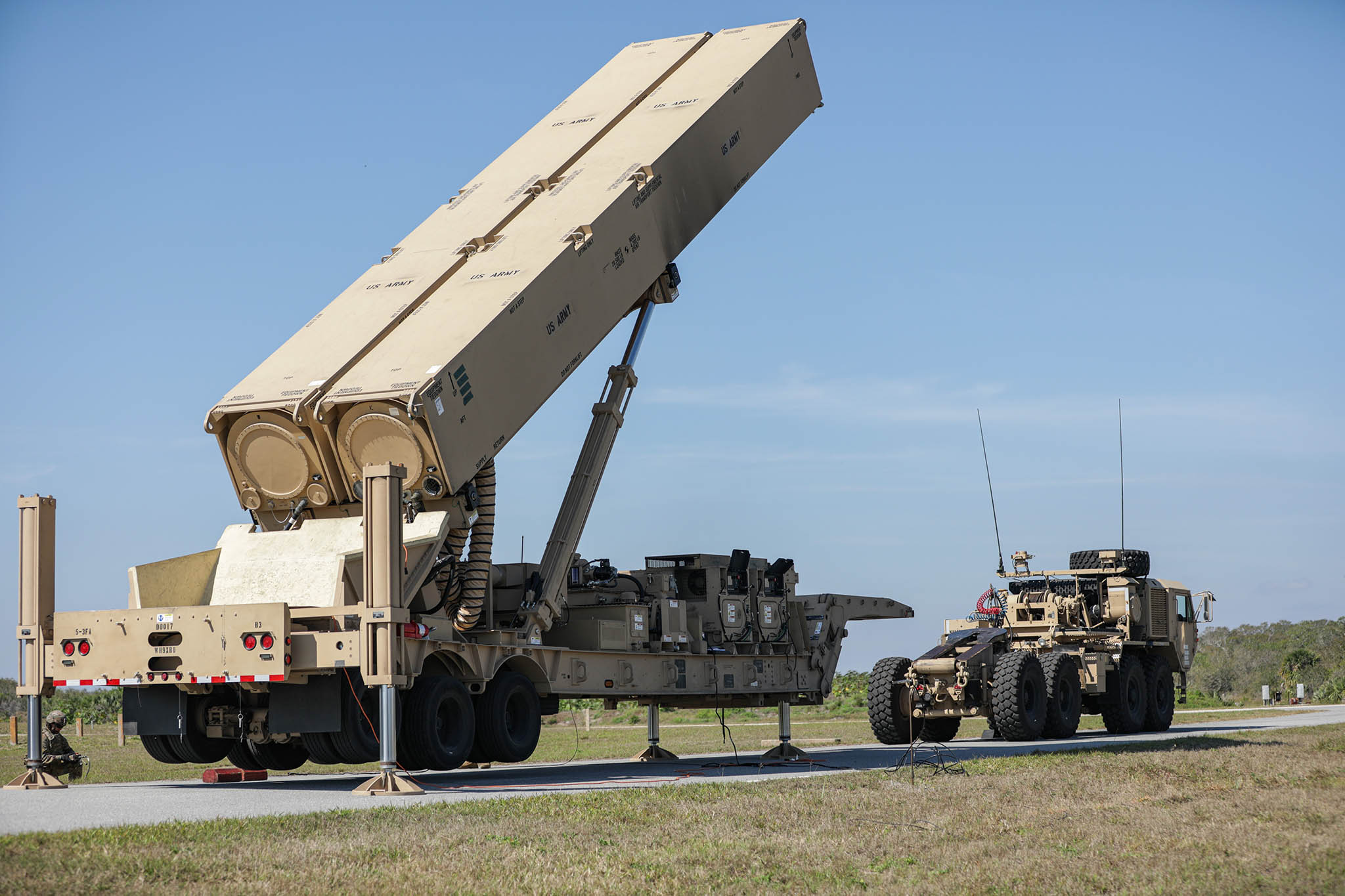 A U.S Army Soldier lifts the hydraulic launching system on the new Long-Range Hypersonic Weapon during Operation Thunderbolt Strike at Cape Canaveral Space Force Station, Florida, March 3, 2023.. (Spc. Chandler Coats/U.S. Army)