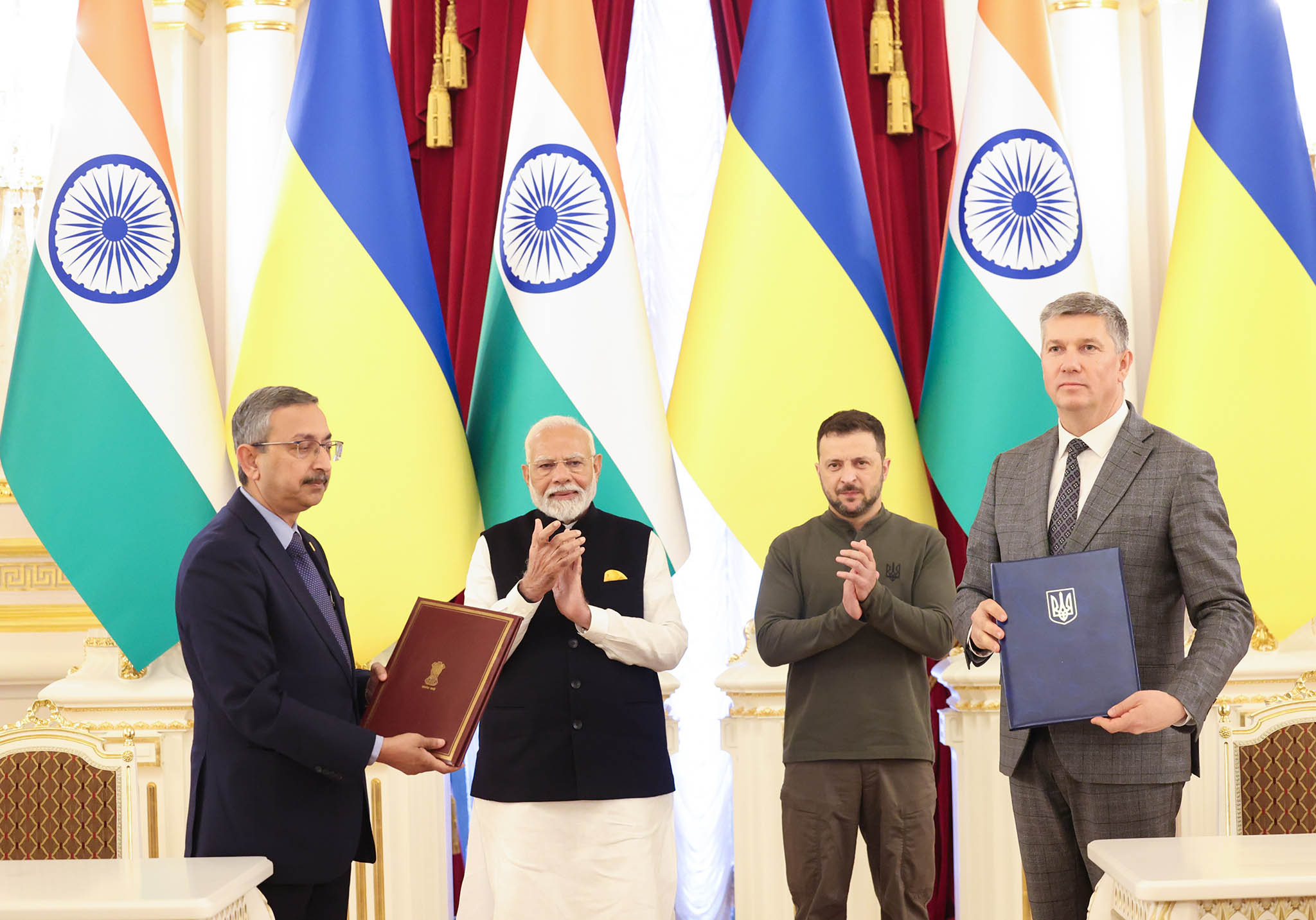 Indian Prime Minister Narendra Modi and Ukrainian President Volodymyr Zelenskyy during the signing of a memorandum of understanding between their governments at the Maryinskyi Palace in Kyiv, Ukraine, Aug. 23, 2024. (Indian Ministry of External Affairs)