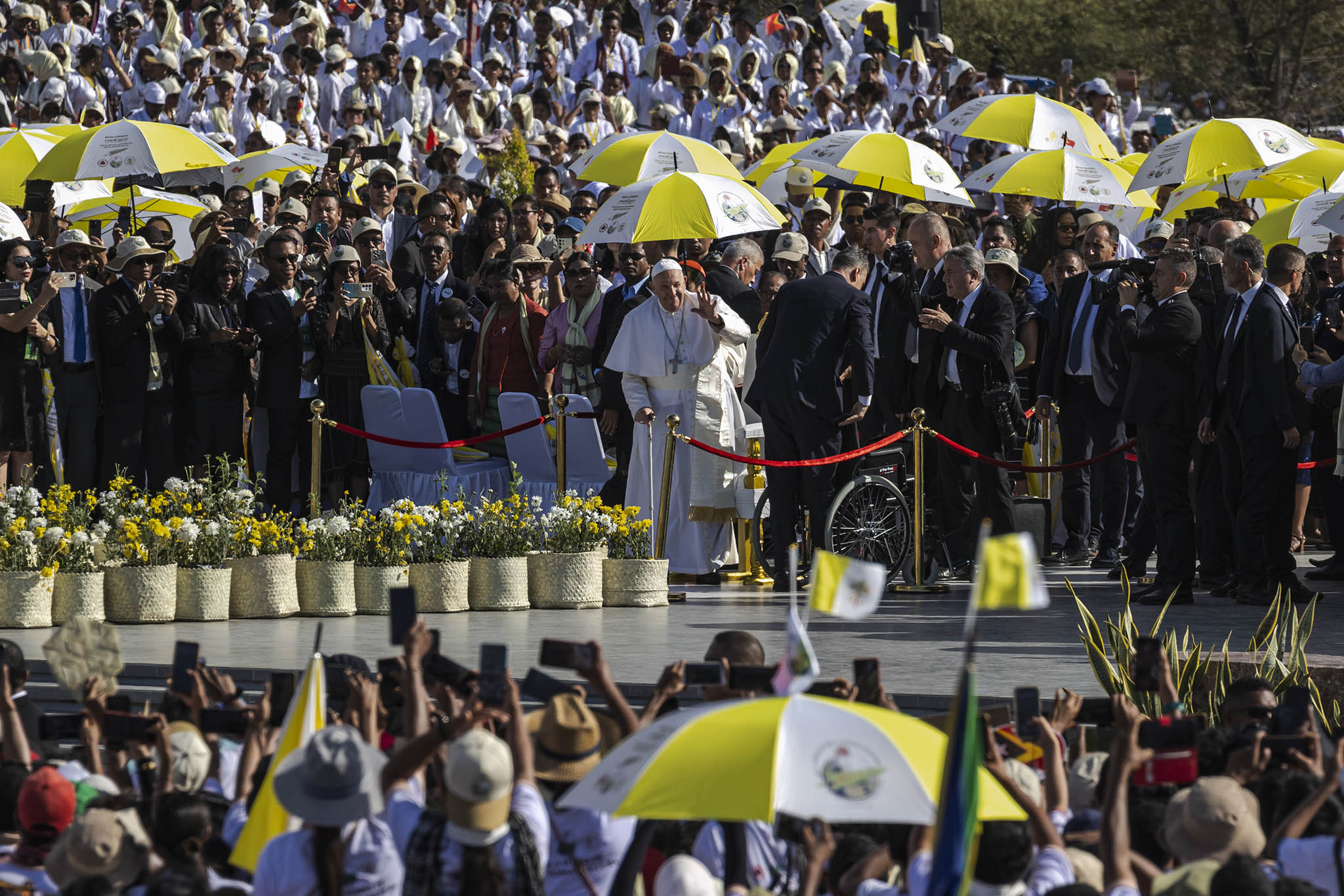 Pope Francis waves to Catholic worshippers ahead of celebrating Mass at the Esplanade of Tasitolu in Dili, East Timor, on Tuesday, Sept. 10, 2024. (Ulet Ifansasti/The New York Times)