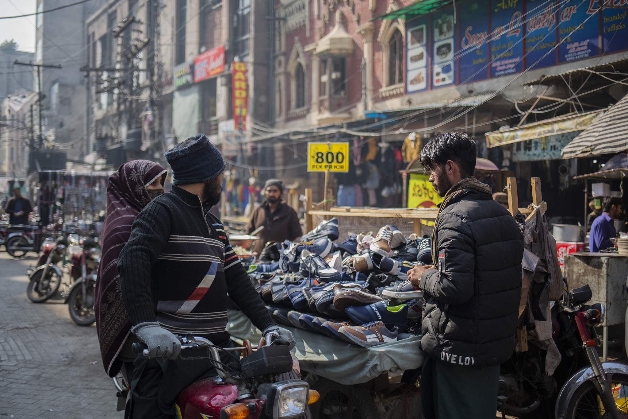 A street vendor on Feb. 7, 2024, in Lahore, Pakistan, where the rising costs of flour and electricity set off a wave of demonstrations that recently spread to nearly every major city in the country. (Saiyna Bashir/New York Times)