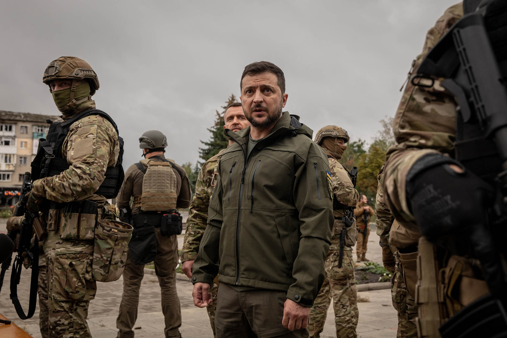 President Volodymyr Zelenskyy of Ukraine makes an unannounced visit to a flag raising ceremony in the main square of the recaptured city of Izium, on Wednesday, Sept. 14, 2022. (Nicole Tung/The New York Times)