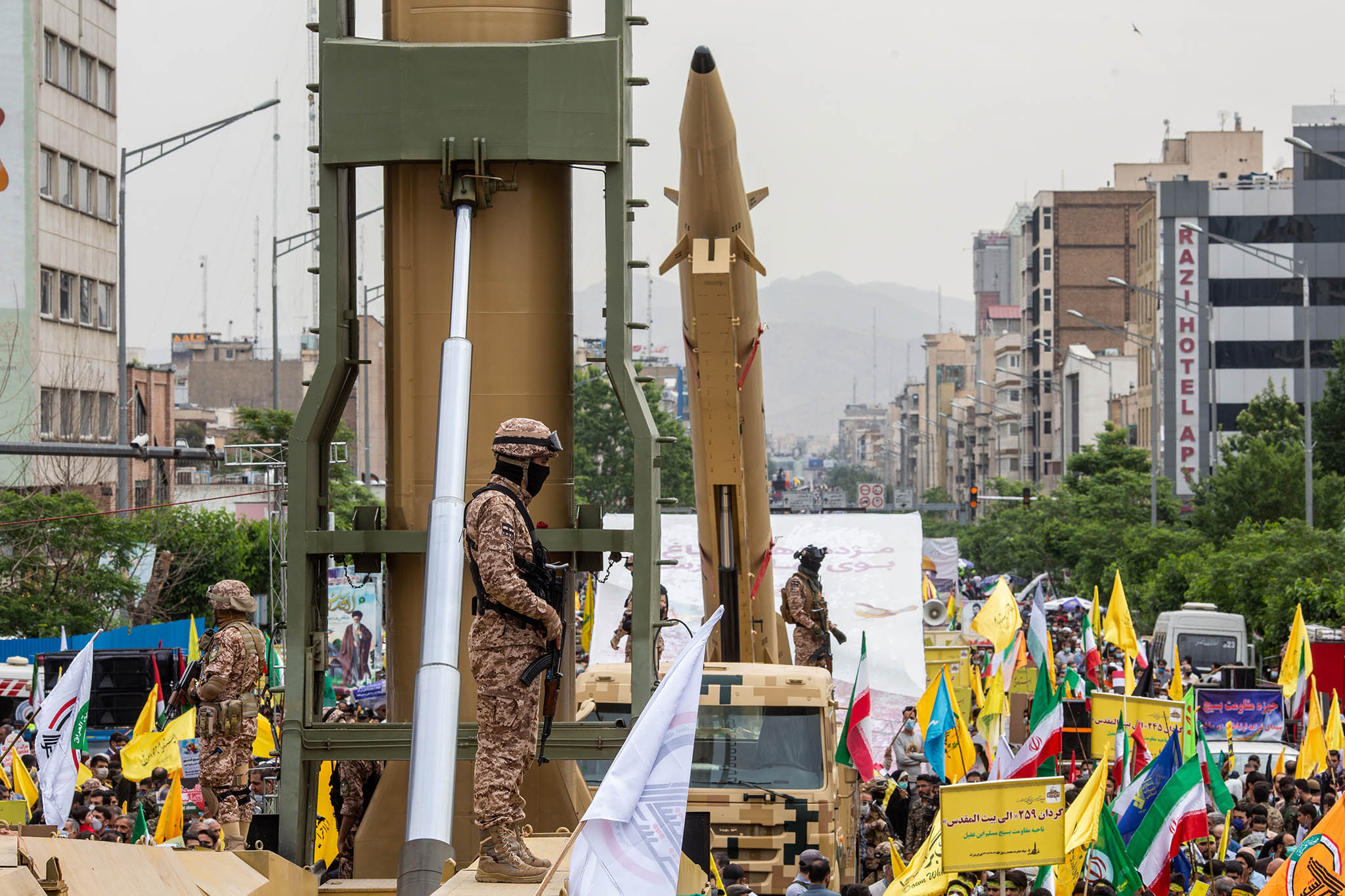 The Islamic Revolutionary Guard Corps unveils what they described as new long-range ballistic missiles during the Quds day march in Tehran, Iran, on April 29, 2022. Arash Khamooshi/The New York Times)