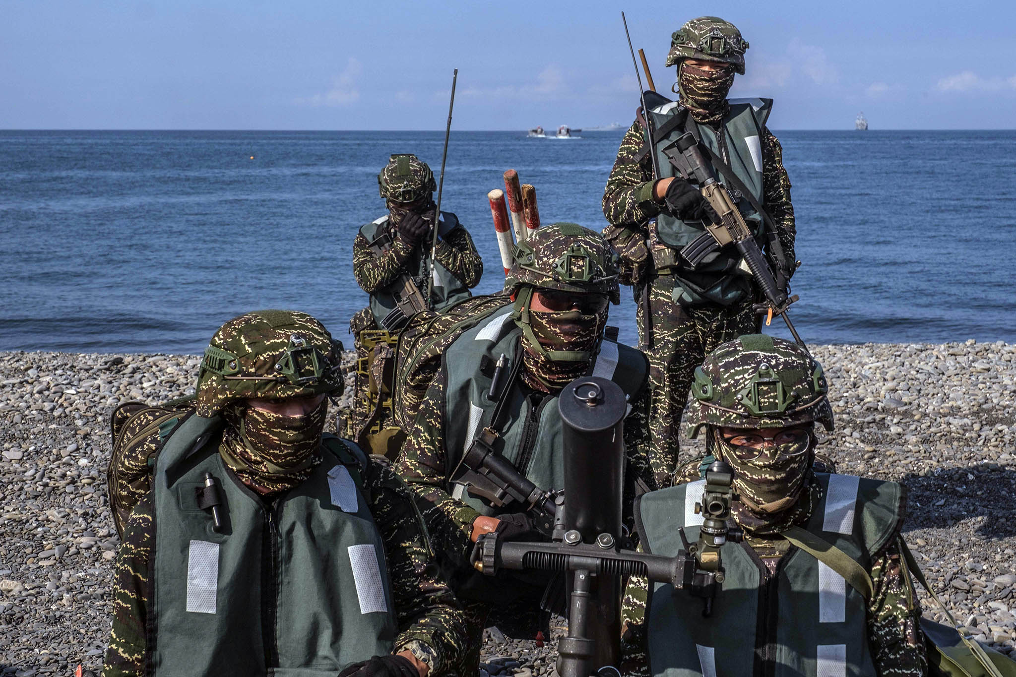 Taiwanese soldiers during an amphibious landing drill on the beach in Pingtung, Taiwan, on Thursday, July 28, 2022. (Lam Yik Fei/The New York Times)