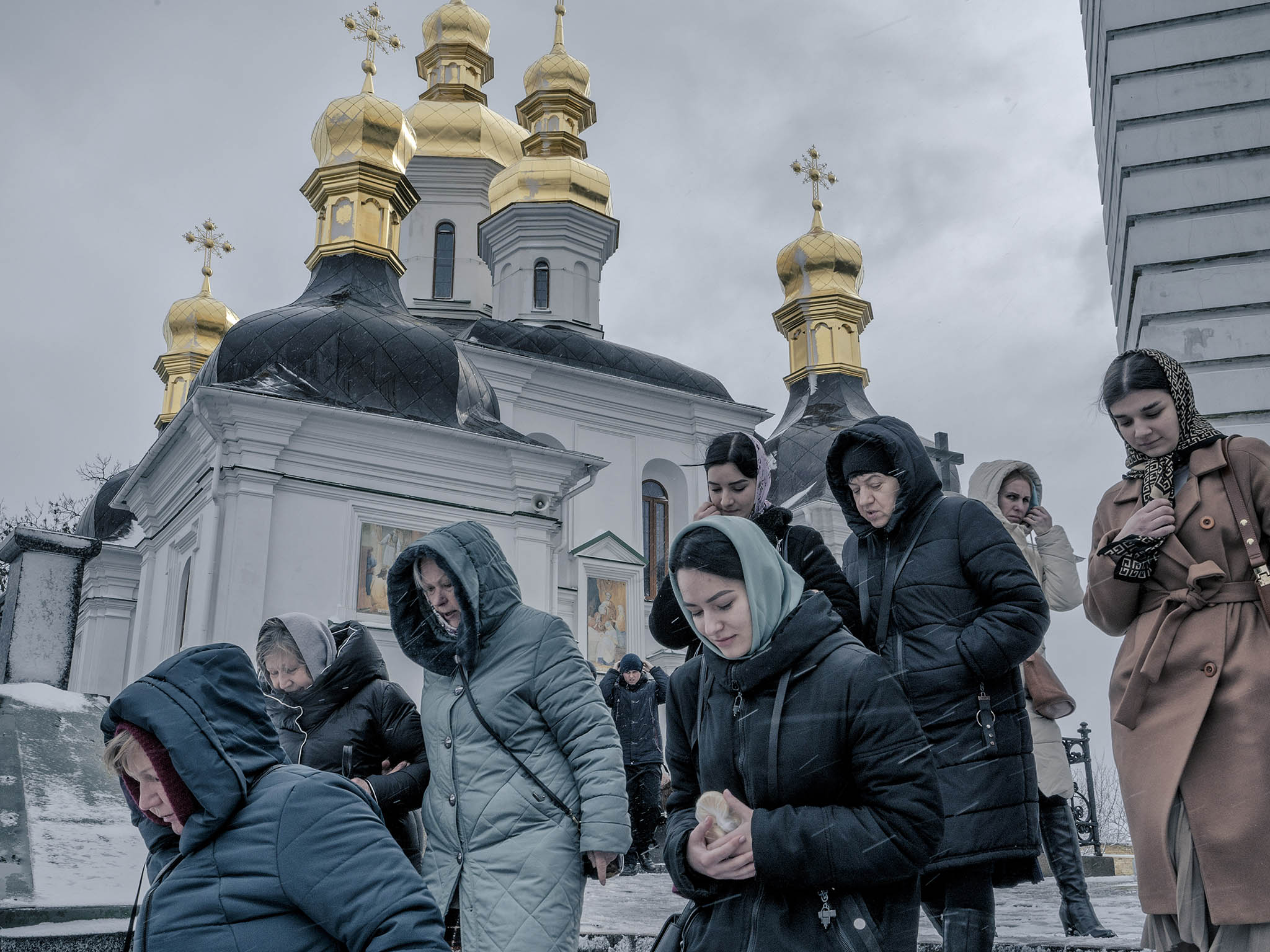 Worshippers at the sprawling Kyiv-Pechersk Lavra, or Monastery of the Caves, in Kyiv, Ukraine. March 12, 2023. (Laetitia Vancon/The New York Times)