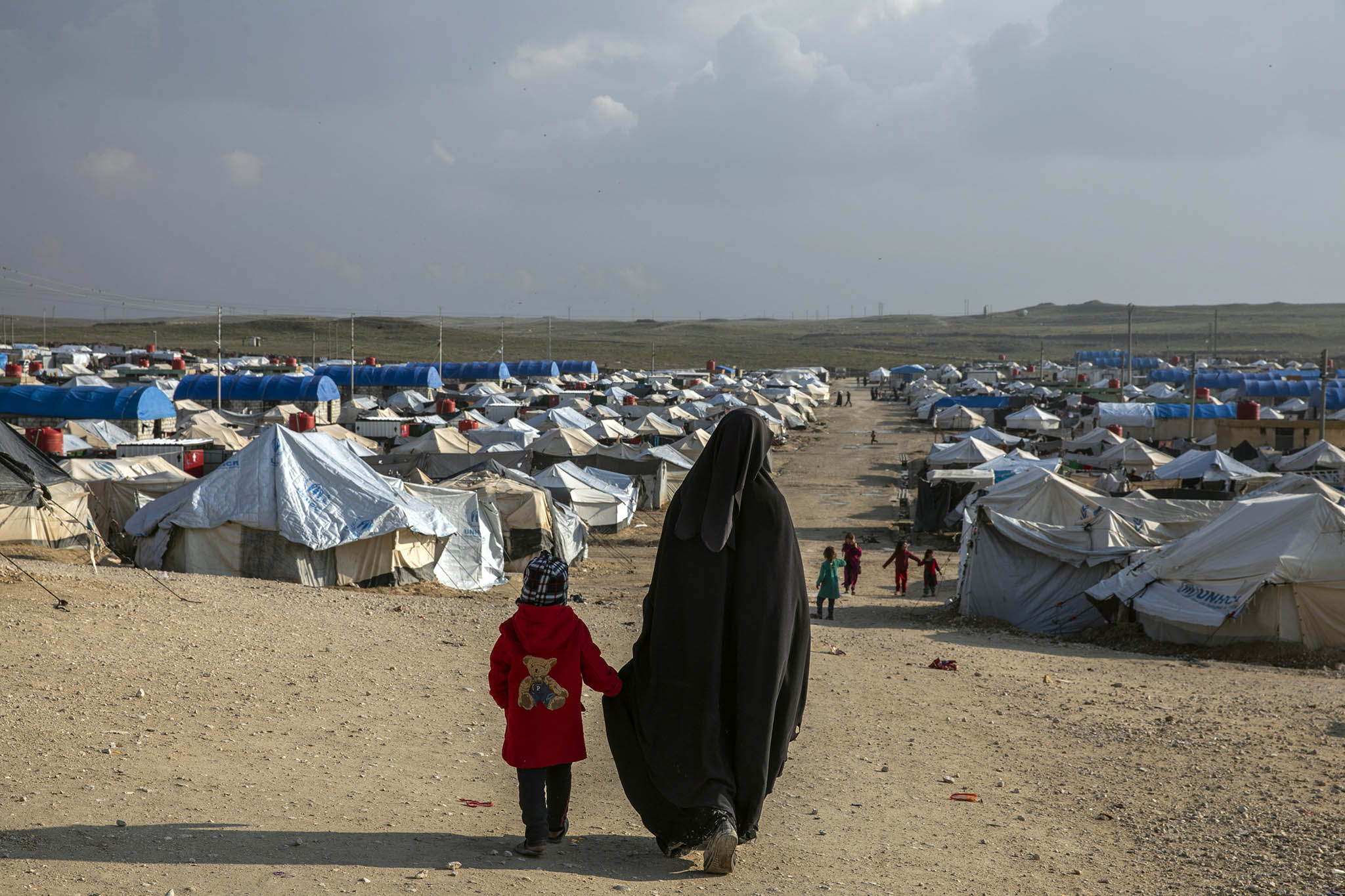 A woman and child at the Al Hol detention camp in northeastern Syria, where hundreds of relatives of Islamic State fighters are held, on Feb. 17, 2019. (Ivor Prickett/The New York Times)