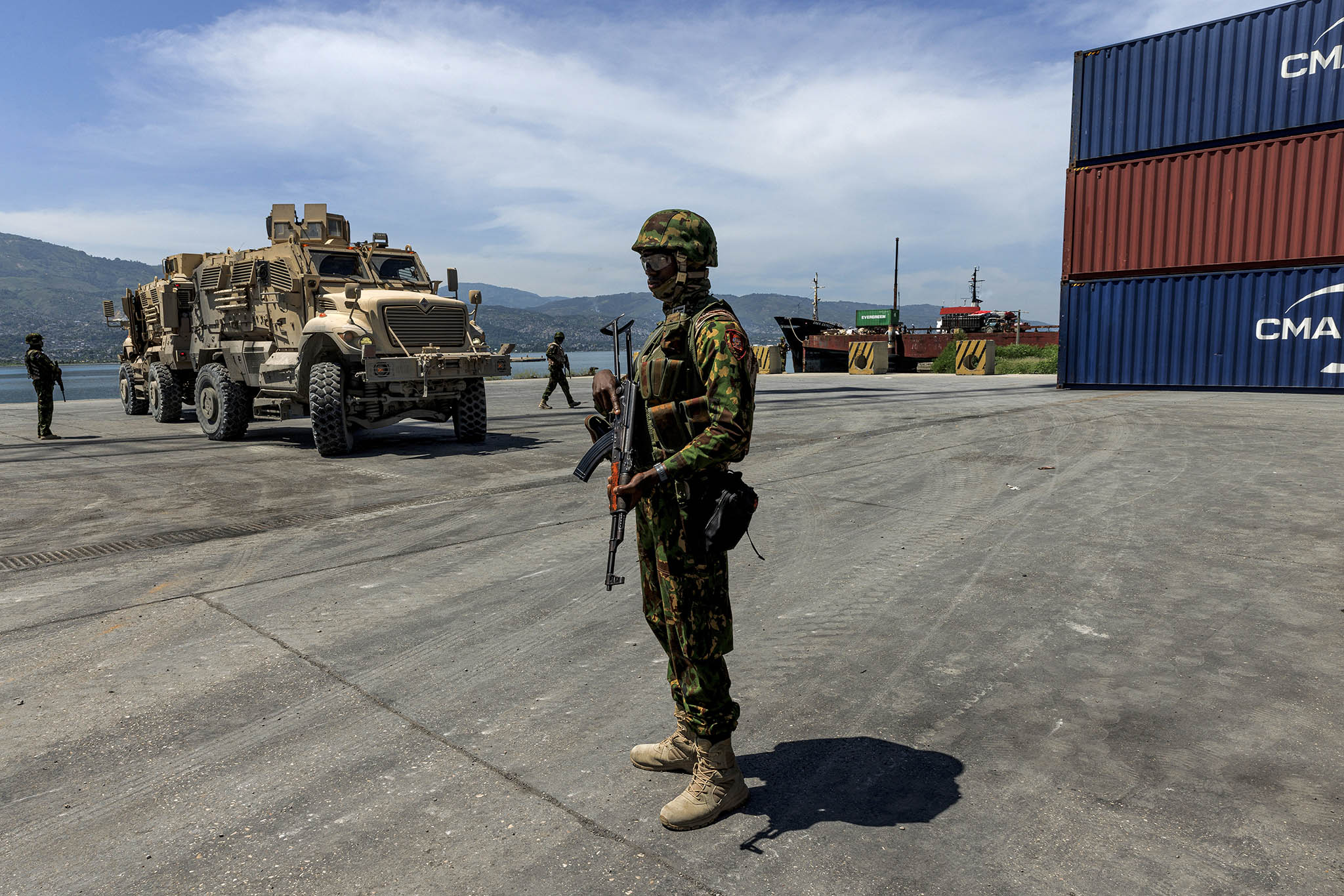 Kenyan police officers, part of the Multinational Support Mission, guard Haiti’s main port in Port-au-Prince, Haiti, Sept. 25, 2024. (Adriana Zehbrauskas/The New York Times)