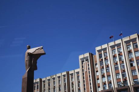 A statue of Lenin guards the parliament in Transnistria, a Russian-backed separatist enclave in Moldova. Russia uses Transnistria to pressure Moldova against joining the European Union as the Moldovan government plans. (Cristian Movila/The New York Times)