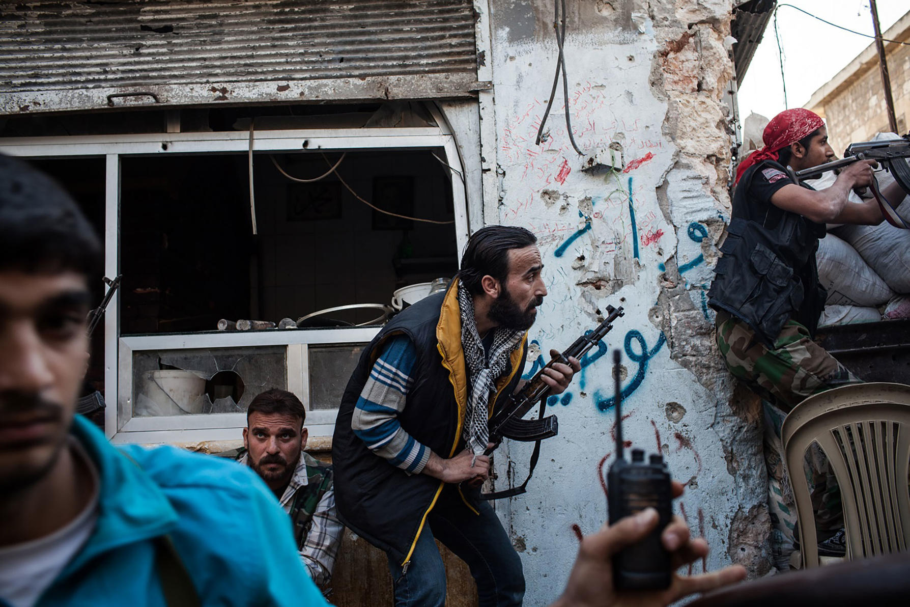  Fighters with the Free Syrian Army on the front line. With limited access to arms, FSA rebels resorted to making their own weapons. Aleppo, Syria.