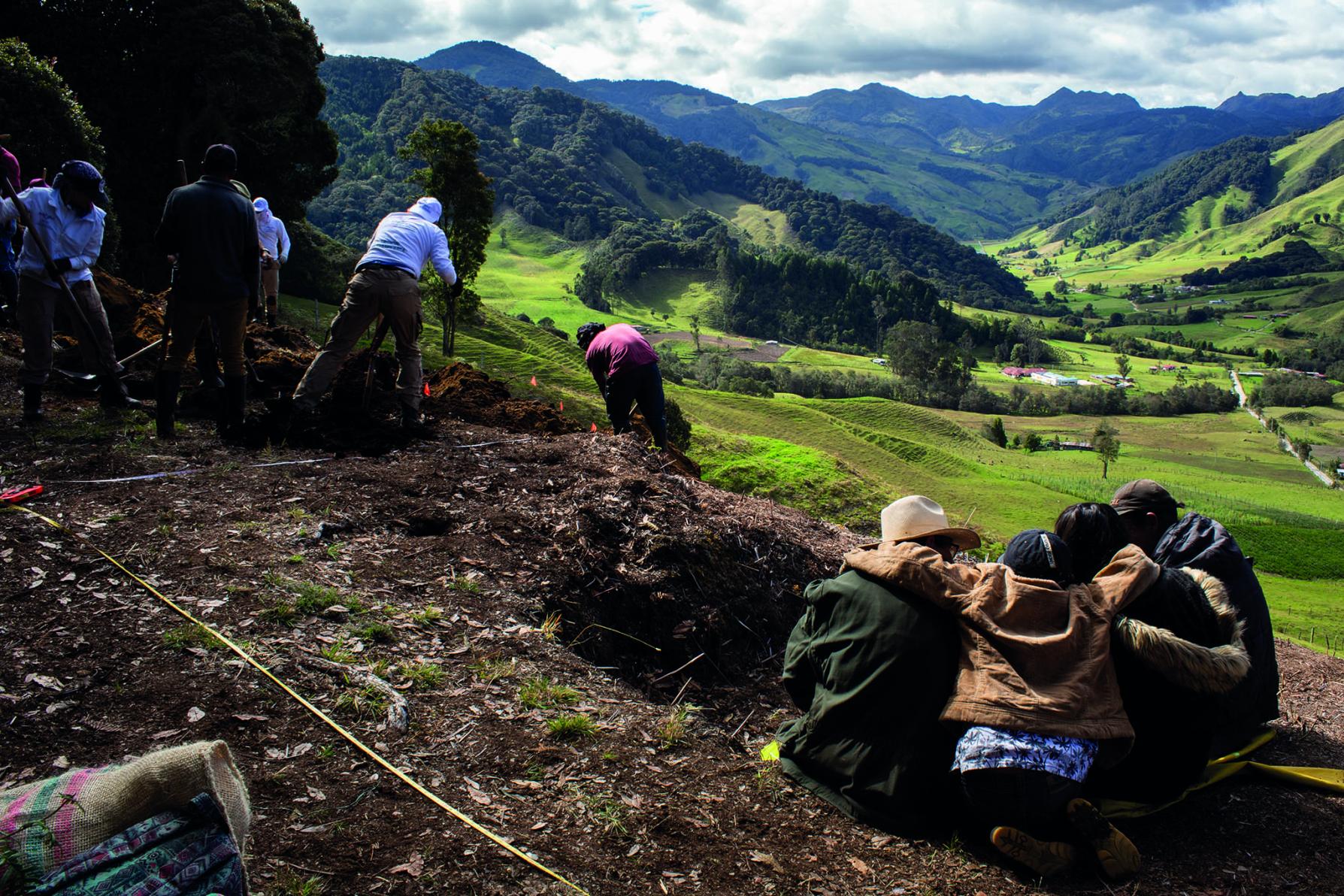 In the department of Tolima in southern Colombia, families of missing persons participate in the excavation of a mass grave site led by the Missing Person Search Unit.