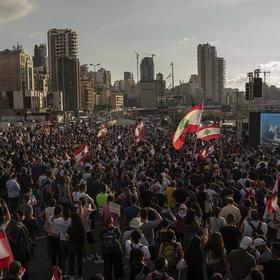 People take part in a moment of silence in Beirut, on Aug. 11, 2020, to honor those killed when a deadly explosion ripped through the heart of the city last week, killing at least 171 people and injuring thousands more. (Diego Ibarra Sanchez/The New York