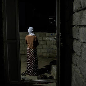 Souhayla, a girl who escaped Islamic State captivity after three years, in her uncle’s home in Shariya, Iraq. July 20, 2017. (Alex Potter/The New York Times)