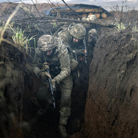 Soldiers with Ukraine’s 17th Tank Brigade practice clearing trenches during a live fire exercise in the Donetsk region of eastern Ukraine on Jan. 4, 2024. (Finbarr O'Reilly/The New York Times)