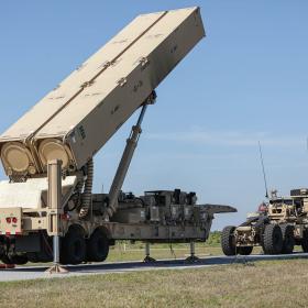 A U.S Army Soldier lifts the hydraulic launching system on the new Long-Range Hypersonic Weapon during Operation Thunderbolt Strike at Cape Canaveral Space Force Station, Florida, March 3, 2023.. (Spc. Chandler Coats/U.S. Army)