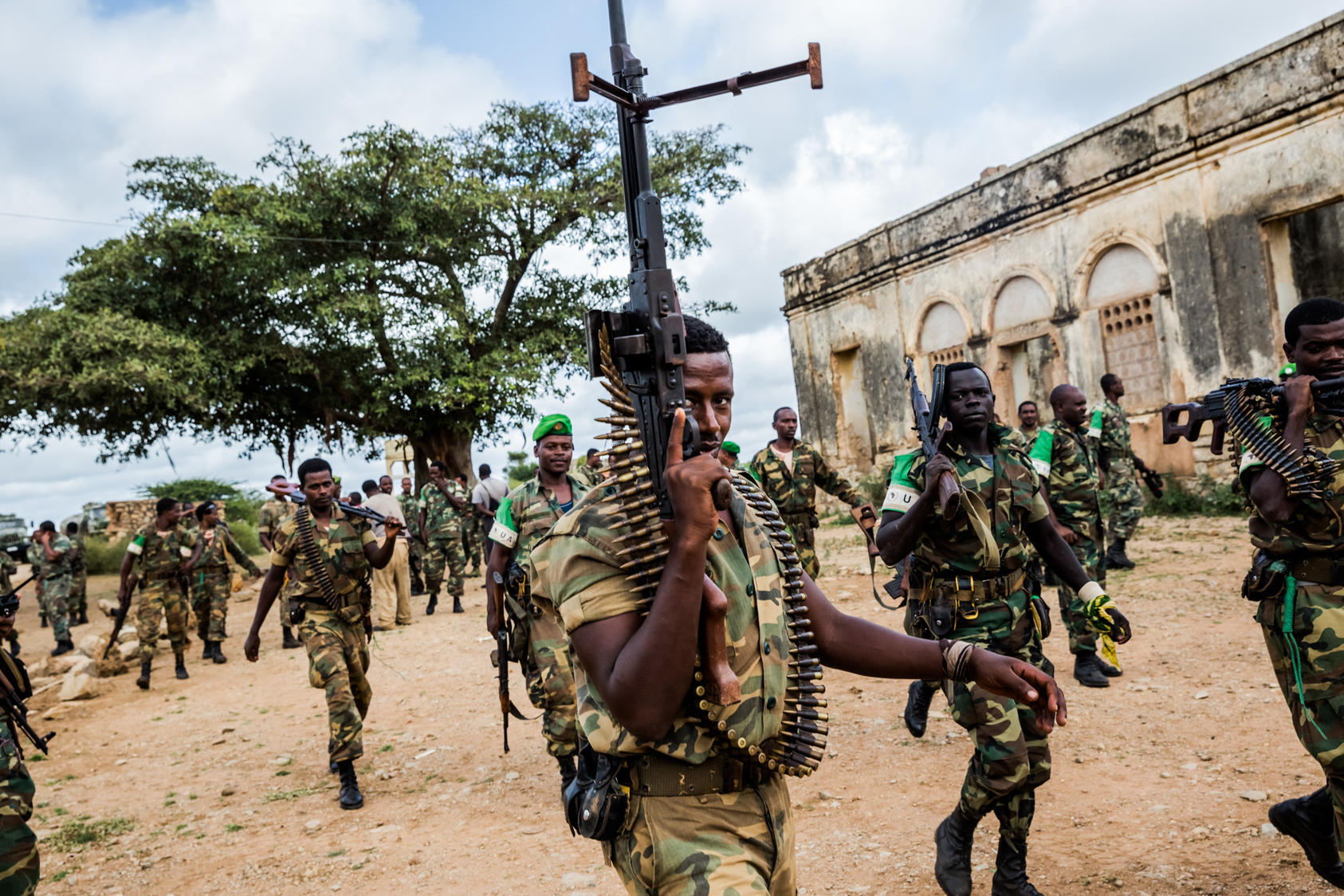 Ethiopian soldiers, part of the African Union peacekeeping mission in Somalia, escort a convoy of trucks carrying food aid in Baidoa, Somalia, June 10, 2014. In a recent attack in Somalia in early 2016, al-Shabab militants massacred as many as 100 Kenyan soldiers in a peacekeeping mission, seizing their equipment. The attack could mark a turning point for the Shabab, one of Africa’s most violent militant groups. (Daniel Berehulak/The New York Times)