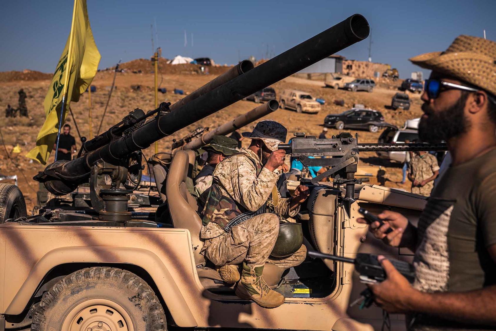 Iranian-backed Hezbollah fighters near the Lebanon-Syrian border. 