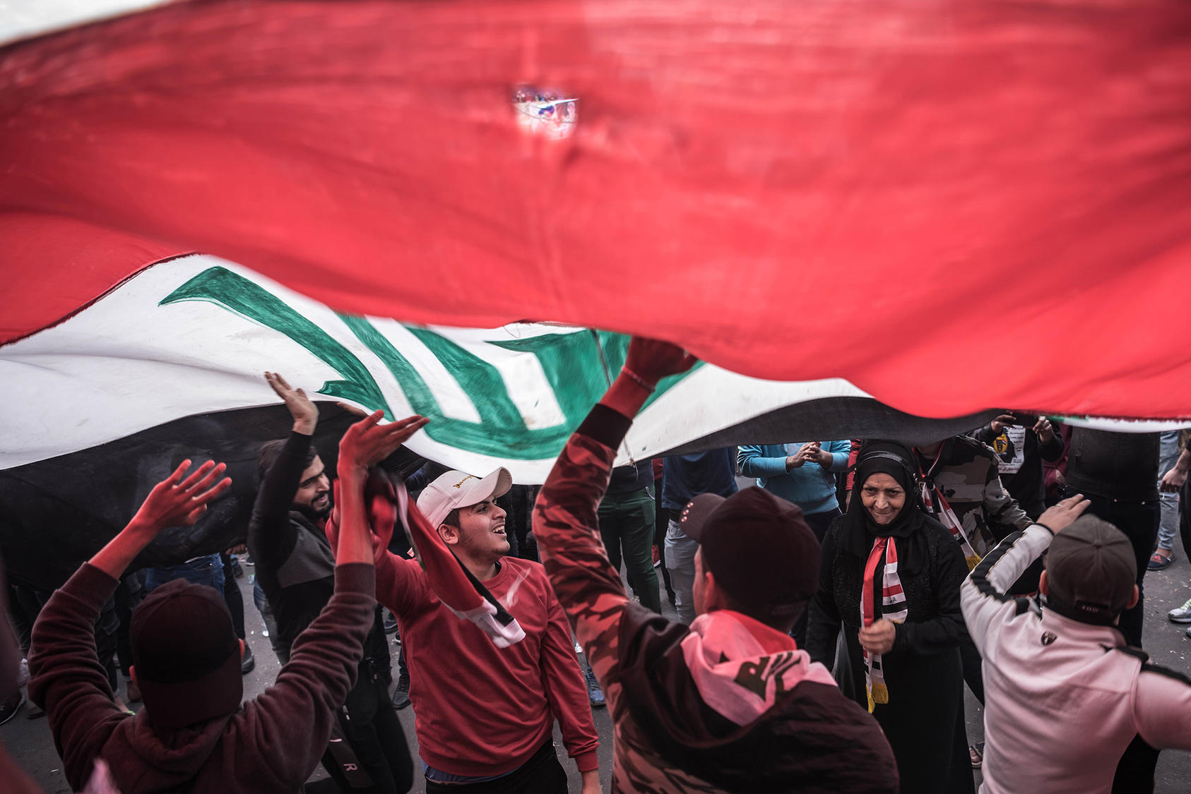 Iraqi demonstrators shout slogans during anti-government protests in Baghdad on Friday, Jan. 10, 2020. (Sergey Ponomarev/The New York Times)