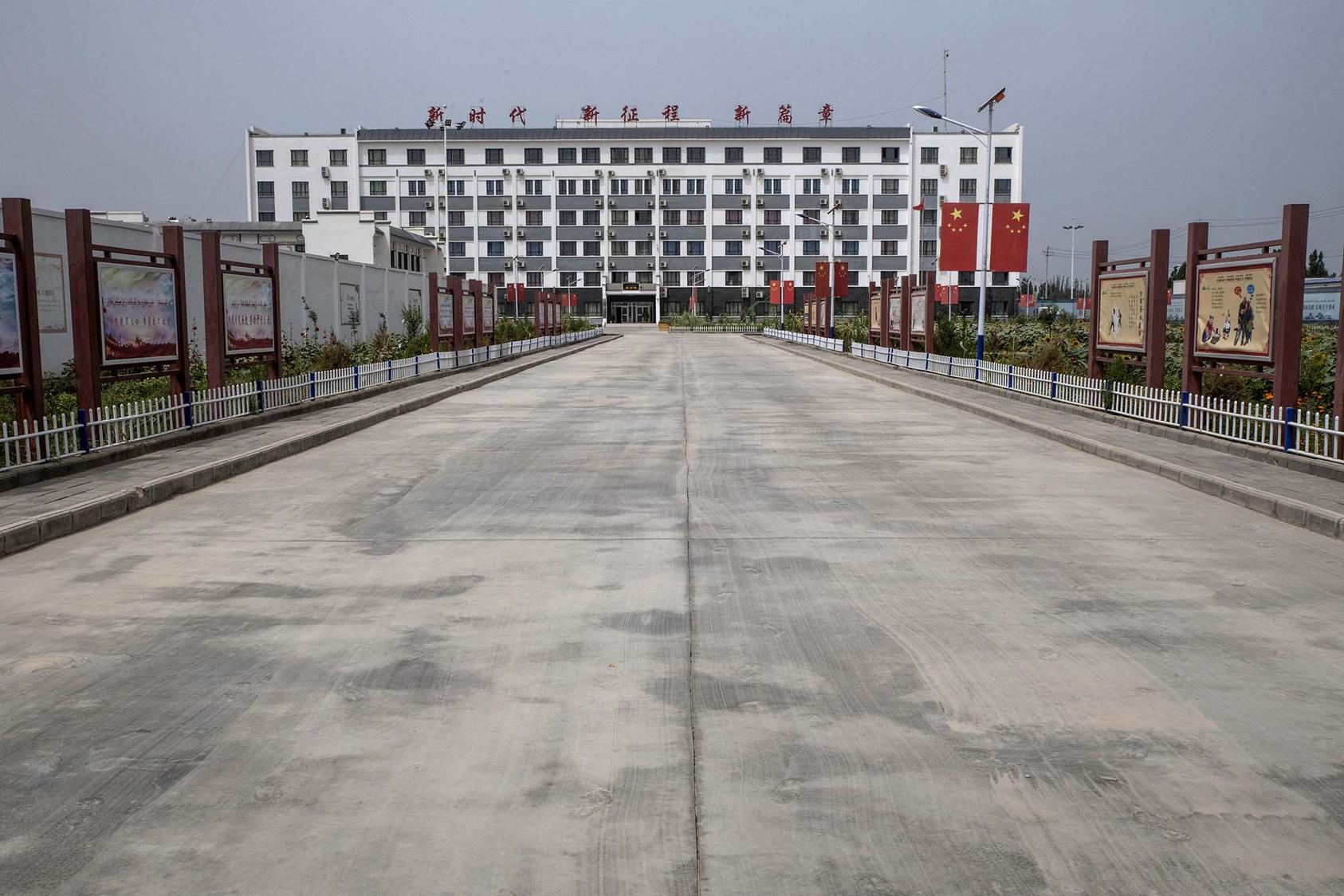 An internment camp near Harmony New Village, a farming settlement in the Xinjiang region of China, Aug. 4, 2019. (Gilles Sabrié/The New York Times)