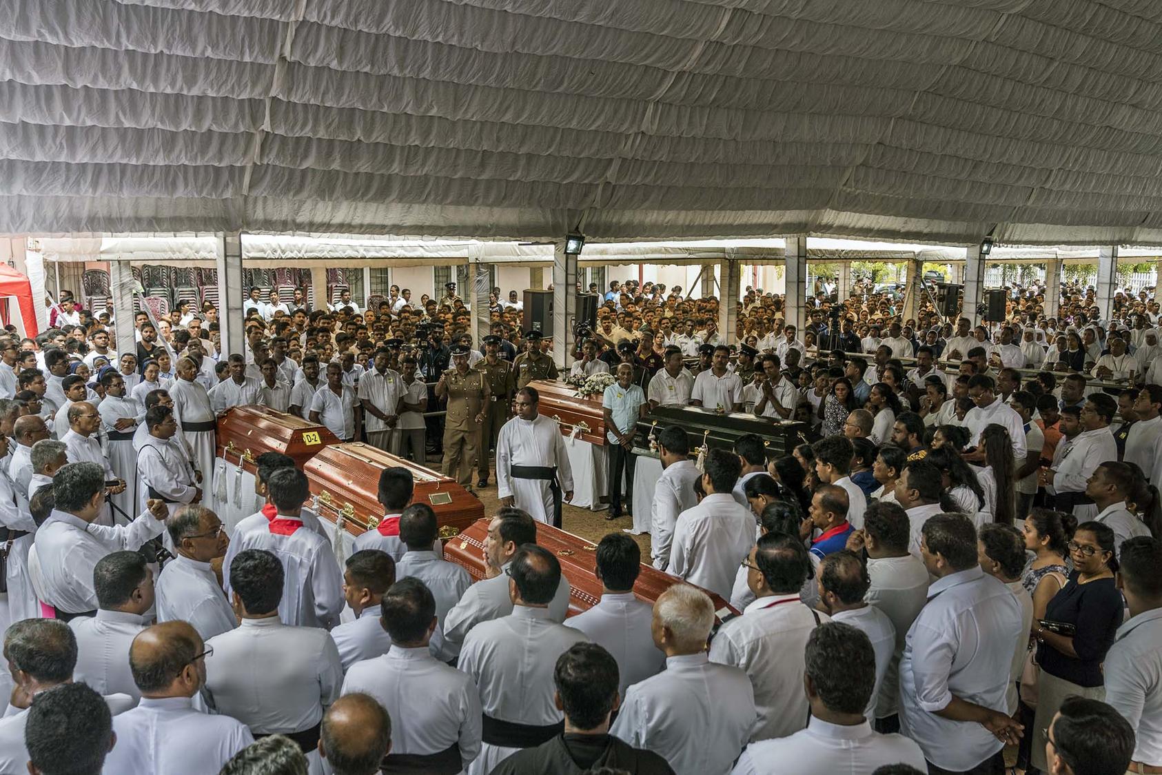 A mass funeral on Tuesday, April 23, 2019, at St. Sebastian’s Church in Negombo, Sri Lanka. (Adam Dean/The New York Times)