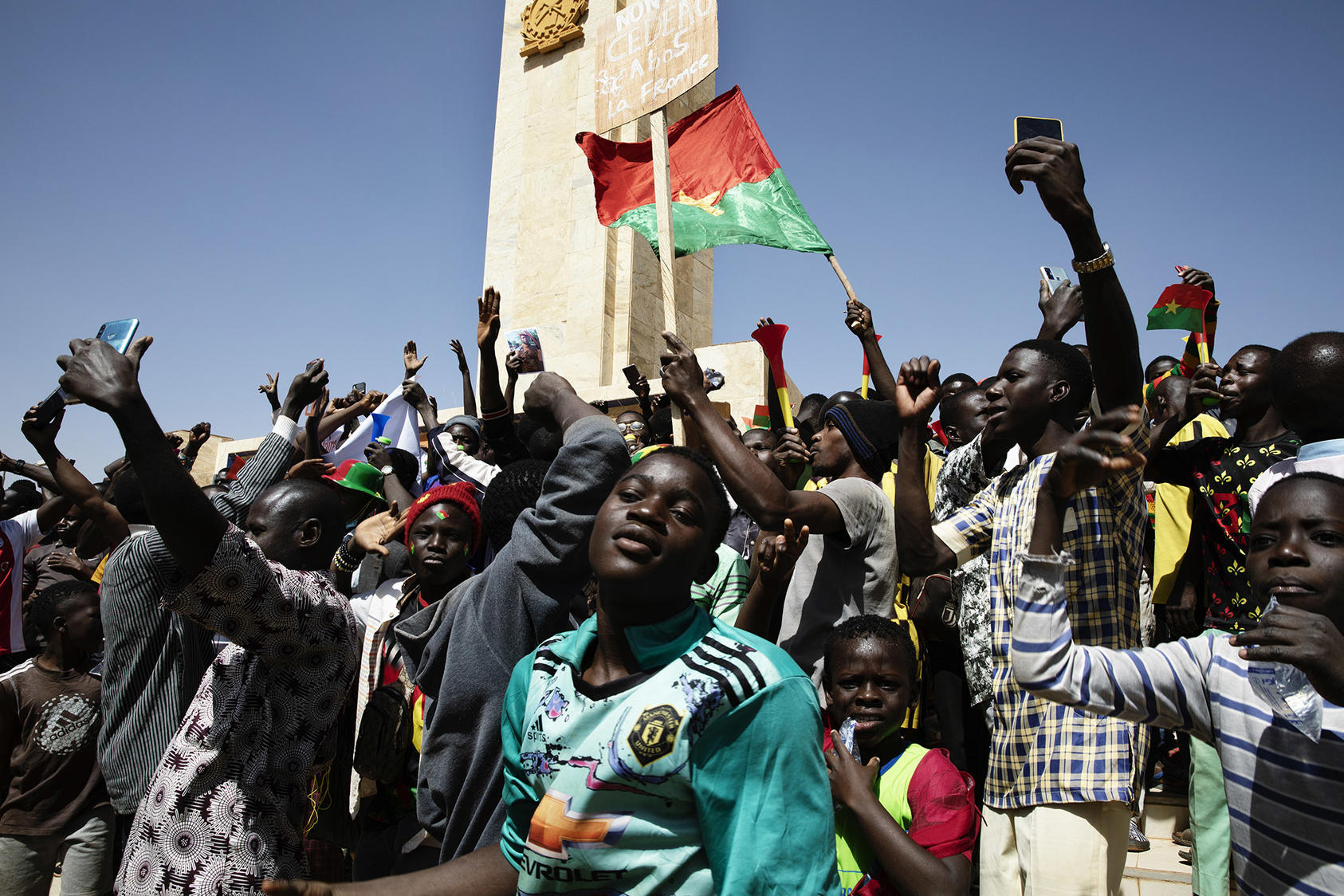 Youth massed in Burkina Faso’s capital after the army ousted the elected government. Five coups in nine months around Africa’s Sahel region reflect a need for better support for democratic governance in fragile states. (Malin Fezehai/The New York Times)