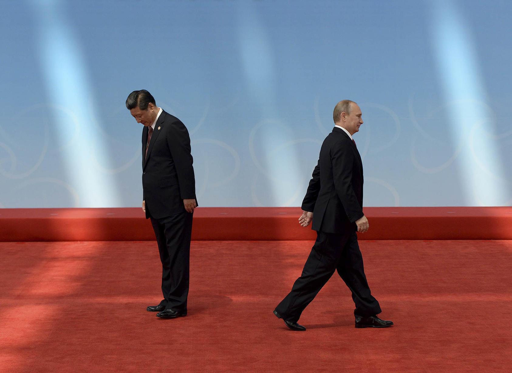 Russian President Vladimir Putin leaves after being greeted by Chinese President Xi Jinping in Shanghai, China. May 21, 2014. (Mark Ralston/Pool via The New York Times)