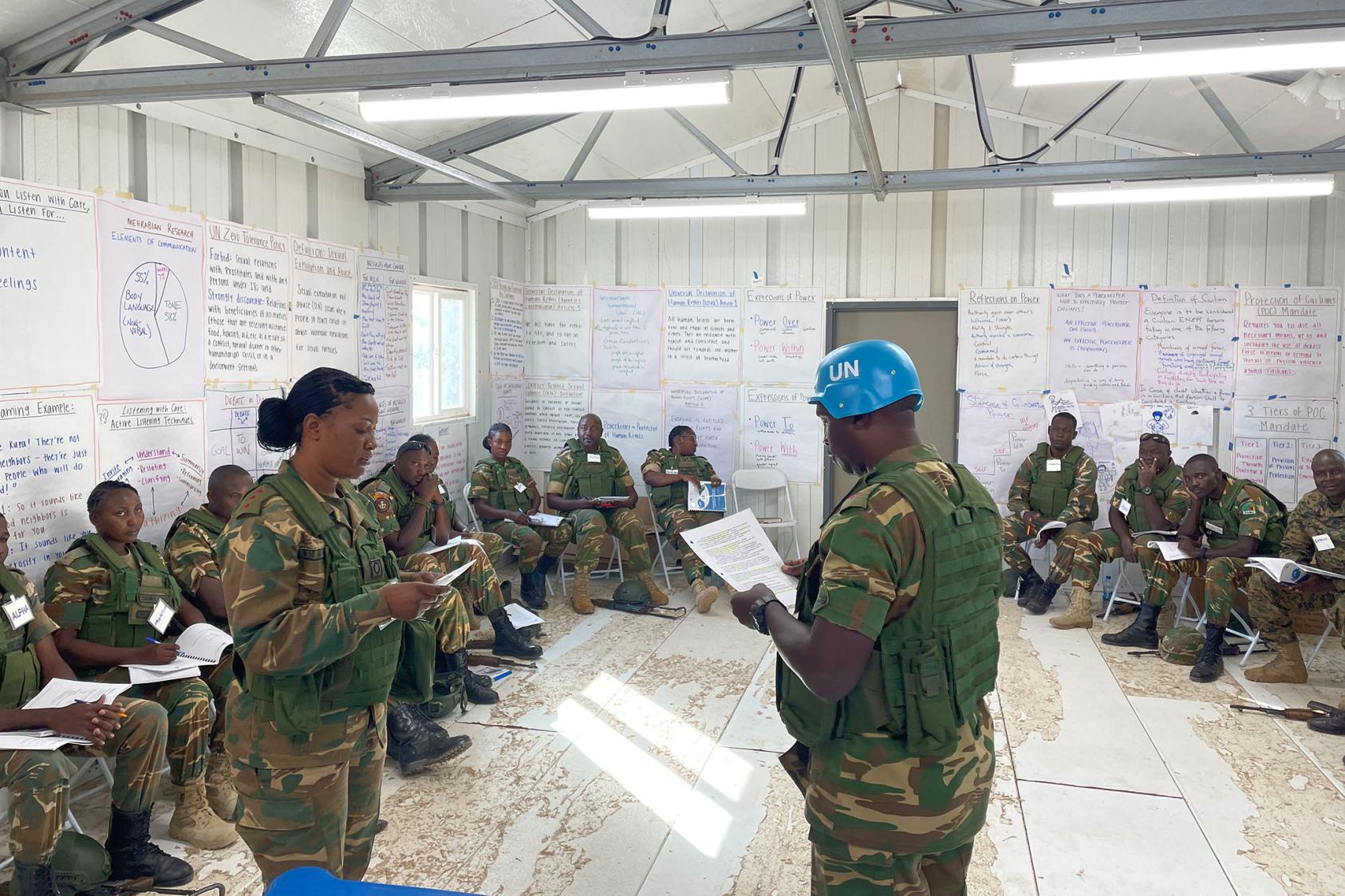 Zambian peacekeepers engage in a roleplay during USIP’s pre-deployment training.