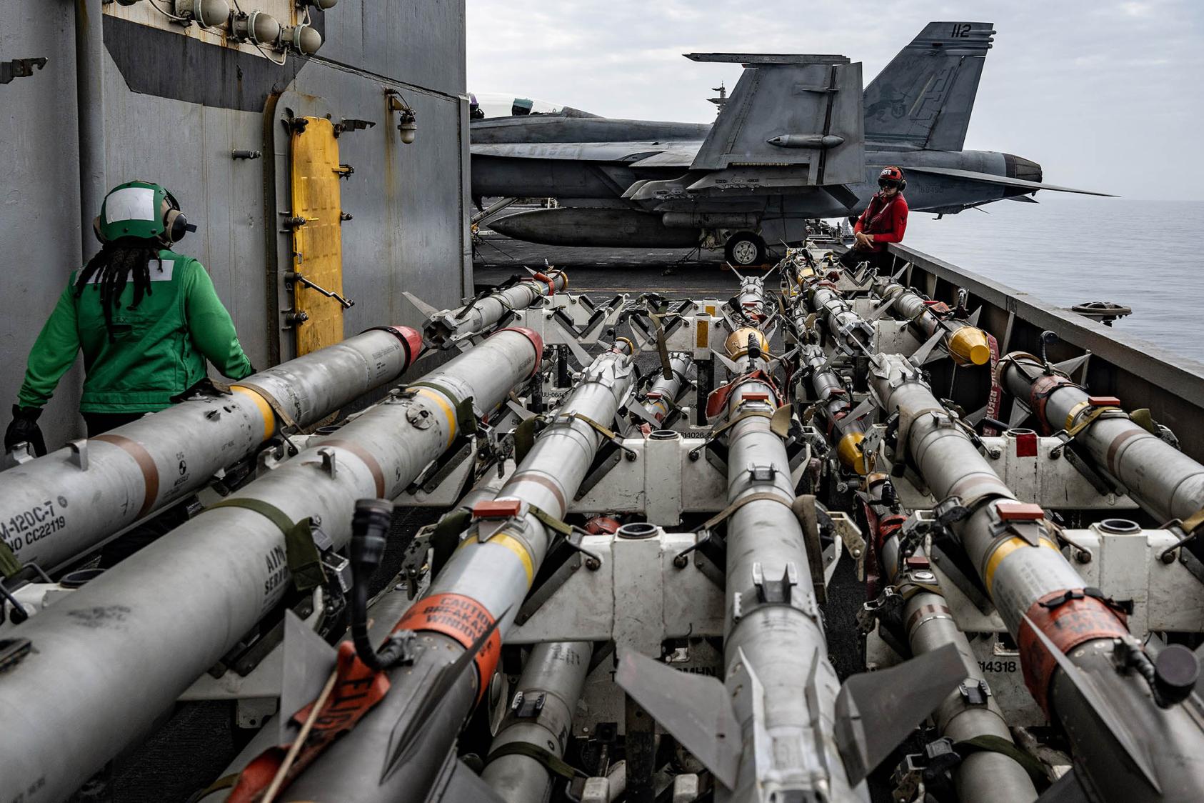 Munitions on the flight deck of the aircraft carrier USS Dwight D. Eisenhower during operations against Houthi targets in the Red Sea, Feb. 21, 2024. (Kenny Holston/The New York Times)