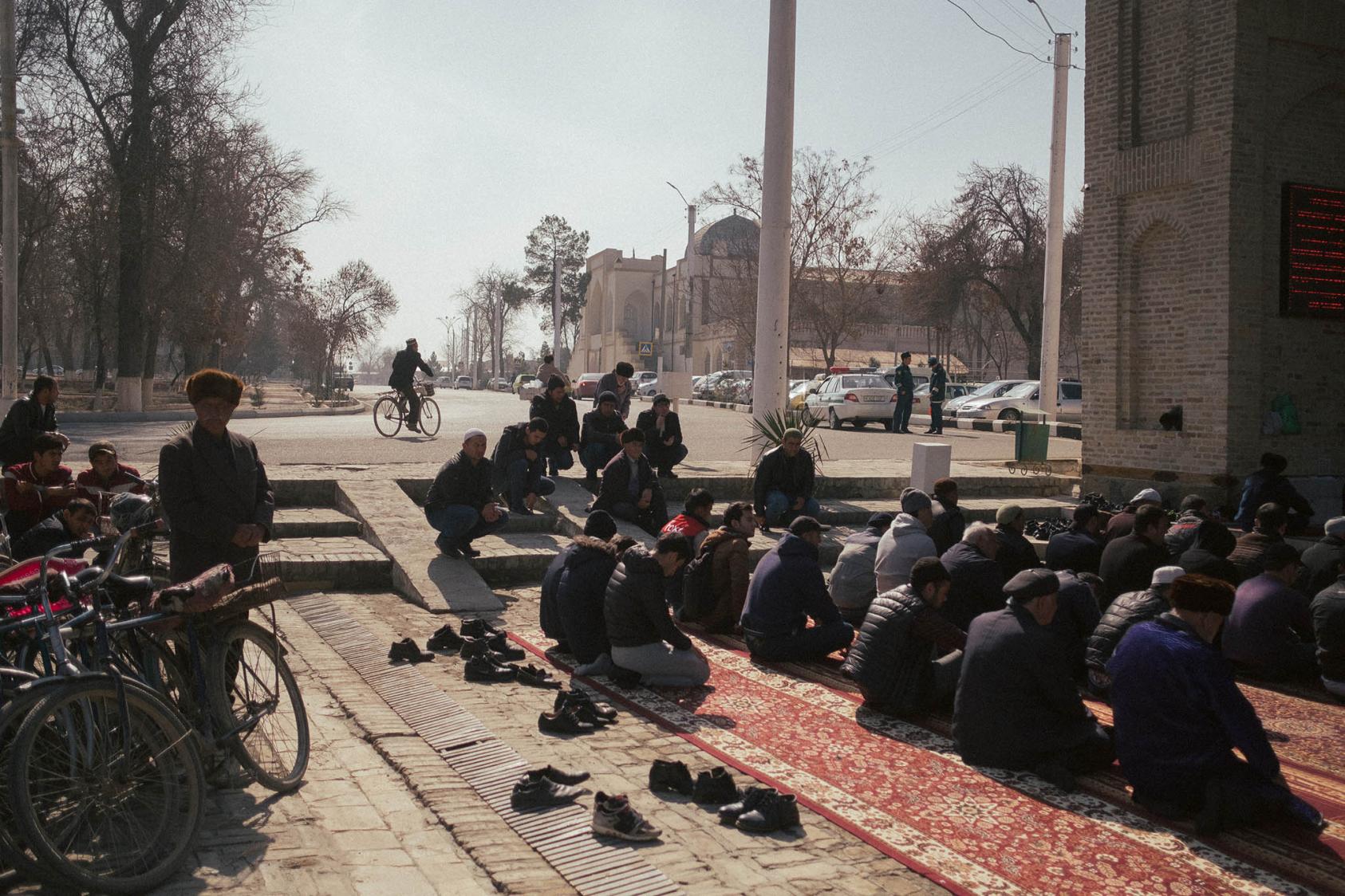 Muslims pray during Friday service in Bukhara, Uzbekistan on Feb. 23, 2018. (Dmitry Kostyukov/The New York Times)