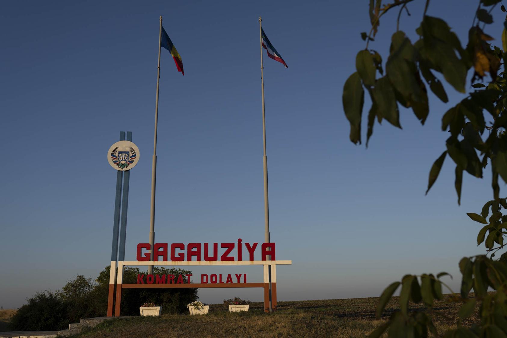 Moldovan and Gagauz flags fly at the border of Moldova’s Gagauz autonomous region. Russia is amplifying fears among the ethnic Gagauz people that they will lose their identity if Moldova joins the European Union. (Andreea Campeanu/The New York Times)