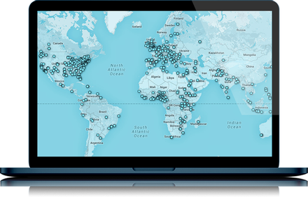 laptop with pinned world map