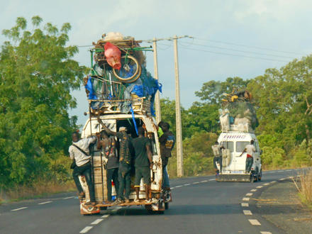 Vans haul goods and passengers along the main highway in Casamance, where the decades of conflict has impeded economic development and led many young people to seek their futures abroad.