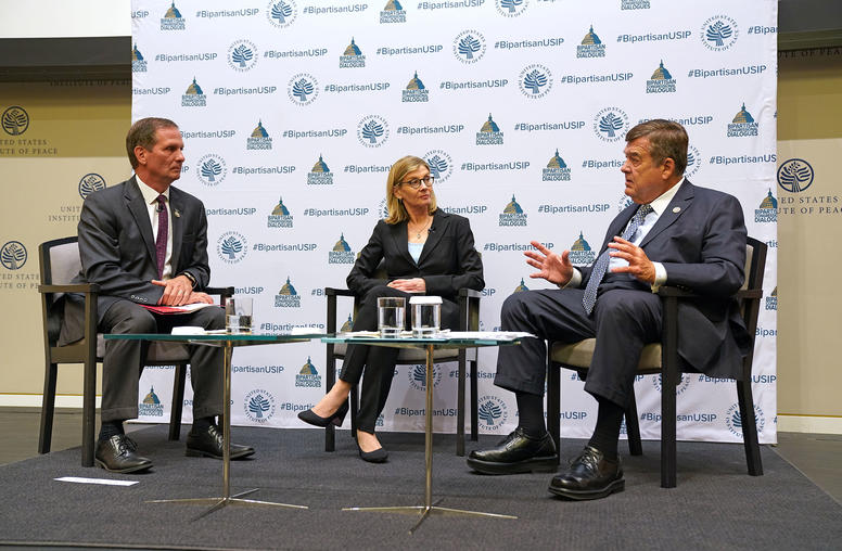 Chris Stewart (R-UT), Nancy Lindborg, and Dutch Ruppersberger (D-MD)