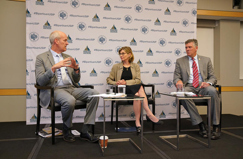 Pictured left to right, Rep. Rick Larsen, Nancy Lindborg, Rep. Darin LaHood