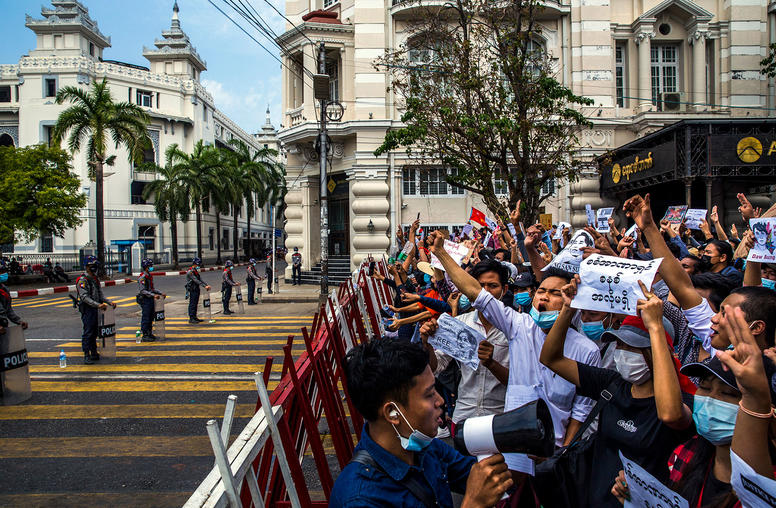 Burmese protesting Myanmar’s coup in February mass opposite a line of police. The coup that month ended a decade-long effort to shift the country away from its decades-long domination by the military toward a real civilian democracy. (The New York Times)