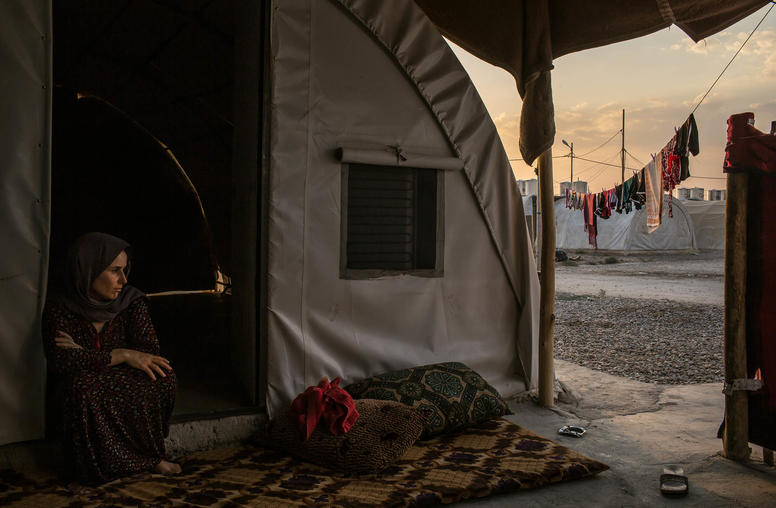 A Yazidi woman in a refugee camp outside Dohuk, Iraq. July 24, 2015. Many Yazidi women were subjected to sexual slavery by the Islamic State. (Mauricio Lima/The New York Times)