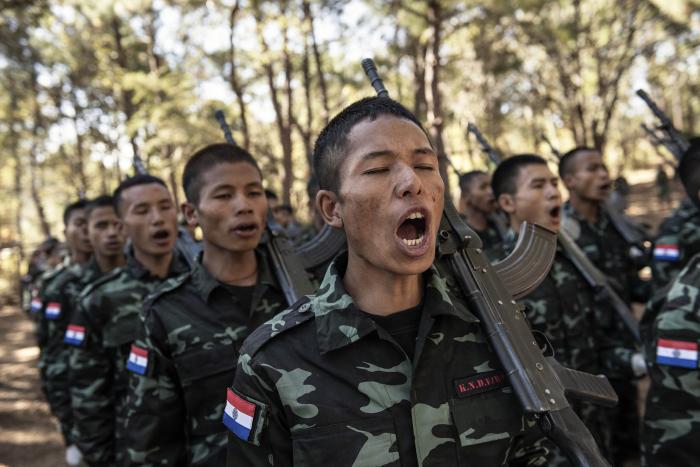 Soldiers from 8th Battalion of the Karenni Nationalities Defense Force, an armed insurgent group, during their graduation ceremony, in Karenni State, in Myanmar, Feb. 1, 2024. (Adam Ferguson/The New York Times)