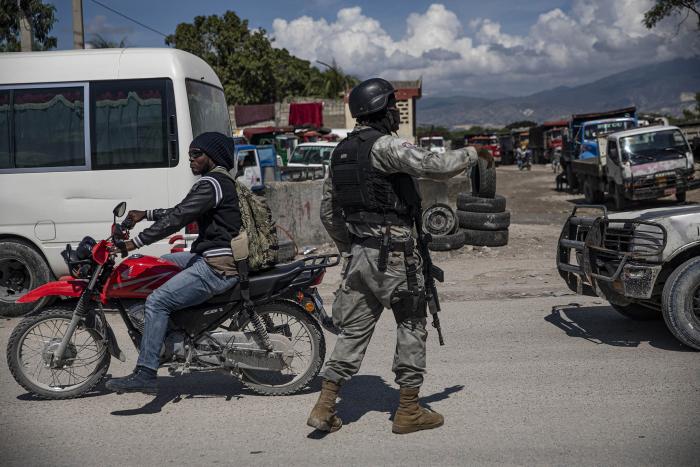 A police checkpoint in Port-au-Prince, Haiti on Oct. 20, 2021. (Adriana Zehbrauskas/The New York Times)