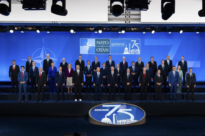 PHOTO: President Joe Biden takes part in a group photo with other leaders at the NATO Summit at the Walter E. Washington Convention Center in Washington, on Wednesday, July 10, 2024. (Eric Lee/The New York Times)
